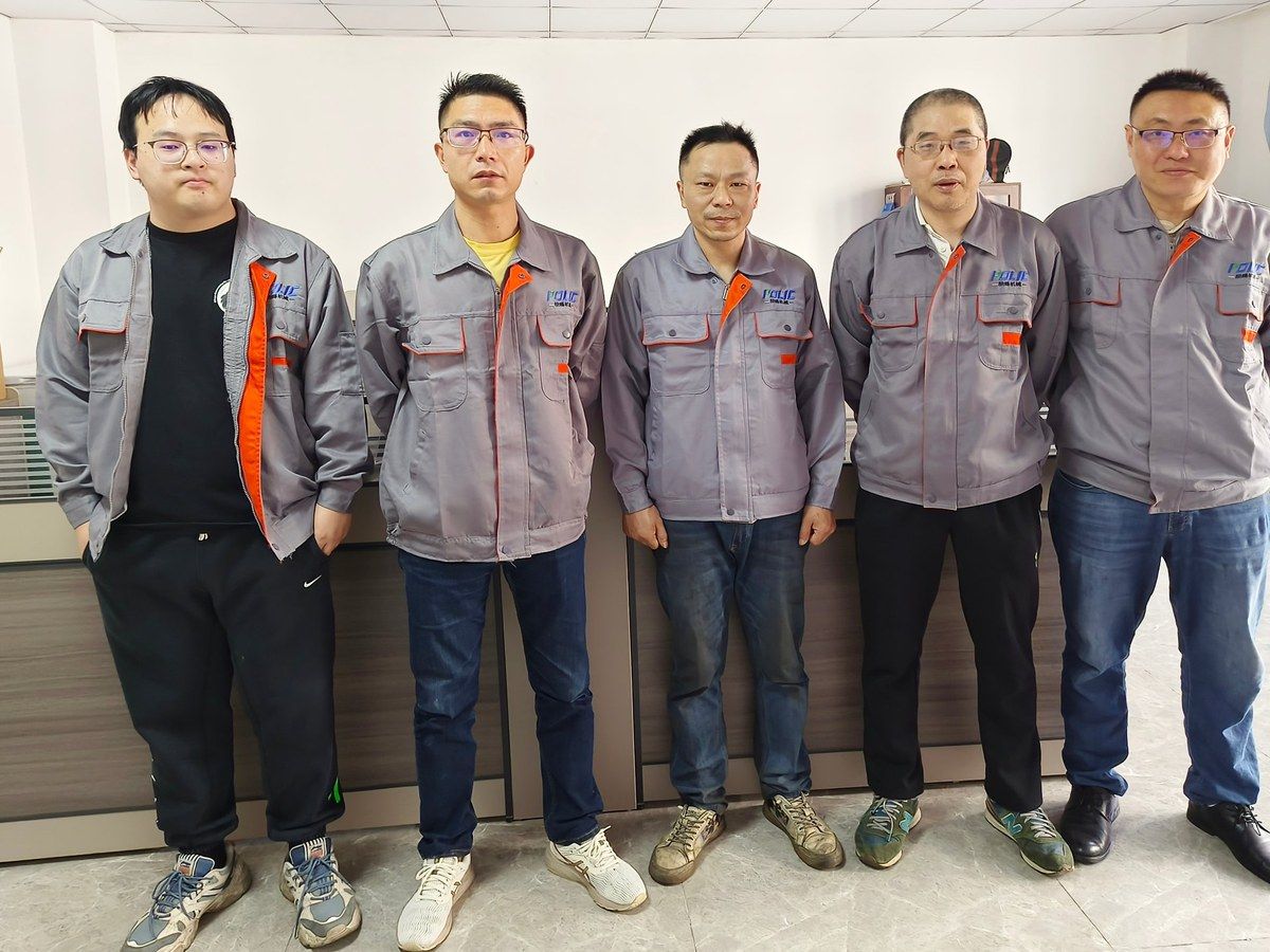 POLYC MACHINE after-sales service engineers in company work uniforms
