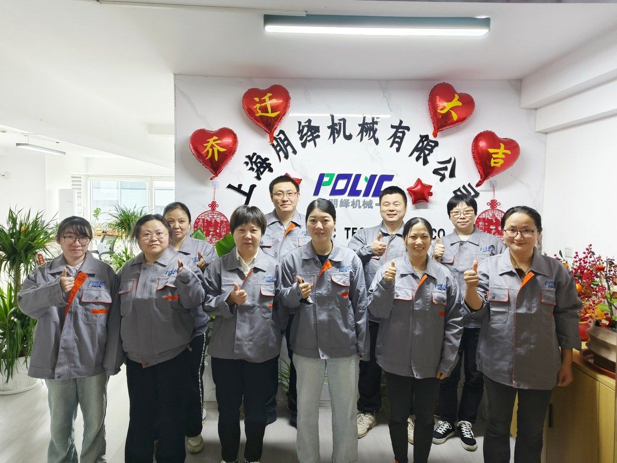 POLYC MACHINE Shanghai office team in front of the company sign